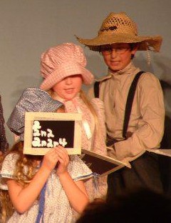 See that handsome devil in the straw hat? The cutie in the bonnet is SCT veteran Emily Browne..and the world may never know who is hiding behind that chalk board...